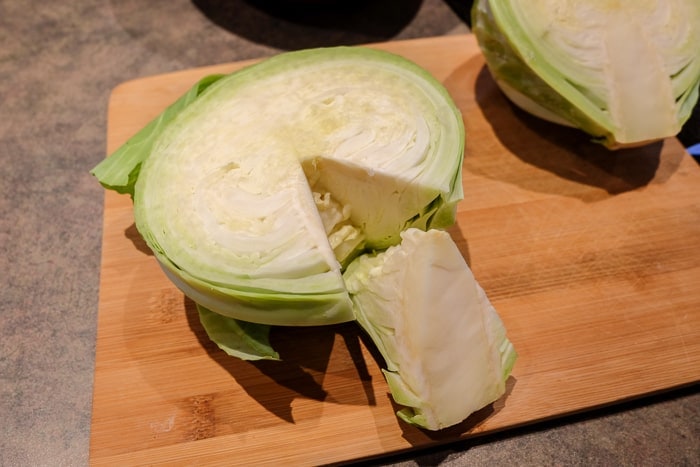 half of a green cabbage with core removed