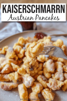 pieces of Austrian torn pancake on plate with fork in foreground holding a piece and text overlay saying kaiserschmarrn Austrian pancakes