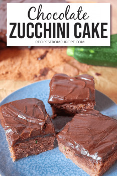 Slices of chocolate zucchini cake with chocolate icing on plate with text overlay saying Chocolate zucchini cake