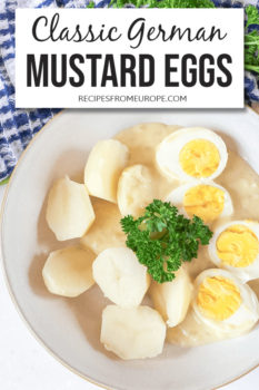 Photo of eggs and potatoes with mustard sauce in bowl and text overlay saying classic German mustard eggs
