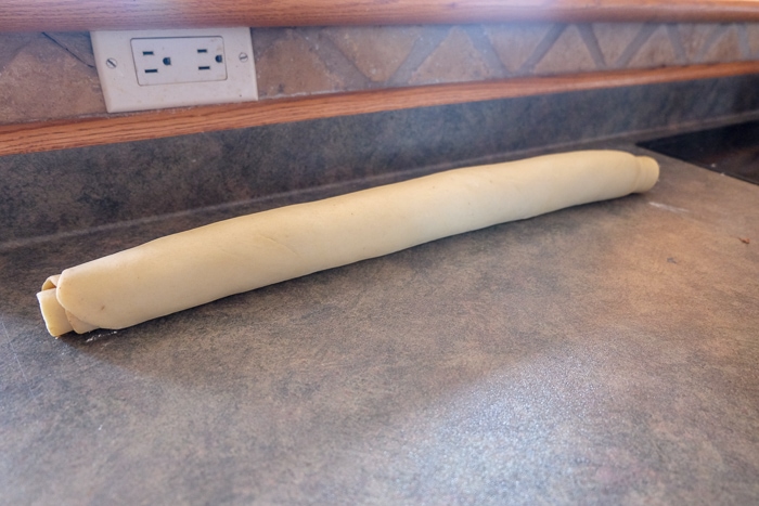 rolled Franzbrötchen dough on counter