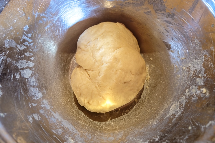 dough in metallic bowl