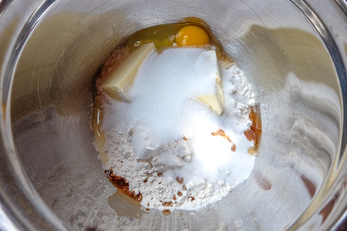 flour sugar and egg in mixing bowl for german butter cookies