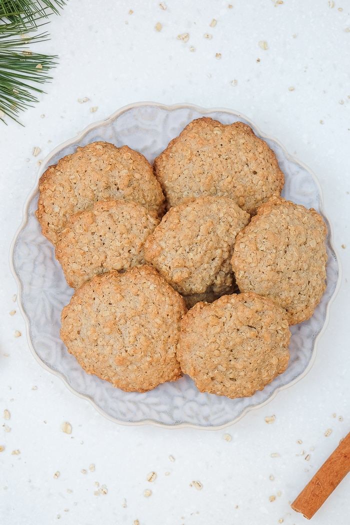 german oatmeal cookies on festive plate with oats around
