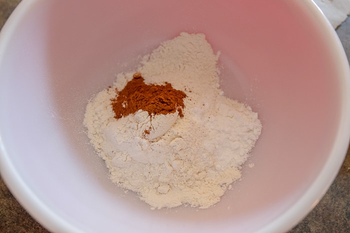 flour and cinnamon in mixing bowl