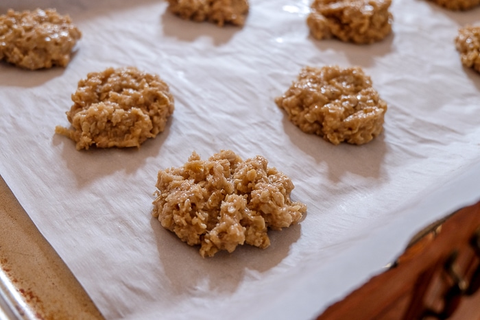 scoop of oatmeal cookie batter on baking sheet