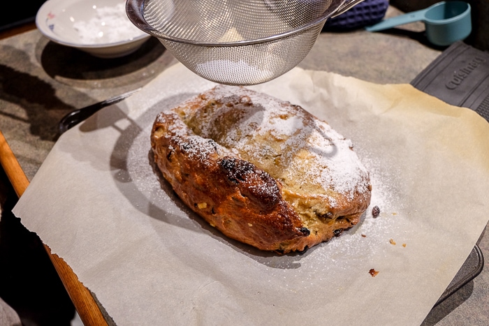 german stollen with icing sugar sprinkling on top