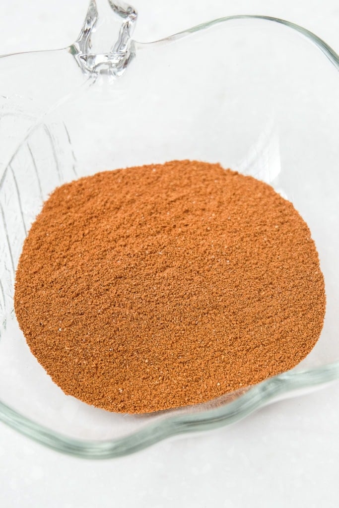 glass bowl with gingerbread spice on white counter