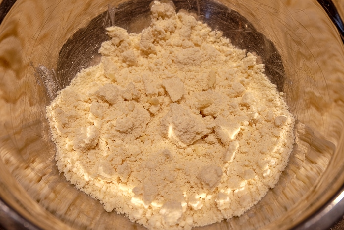 marzipan recipe ingredients in metallic mixing bowl