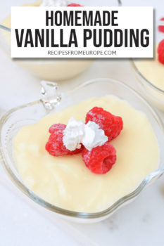 Photo of vanilla pudding in clear bowl with raspberries and whipped cream on top plus text overlay saying homemade vanilla pudding