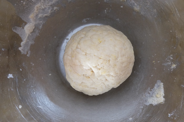 ball of dampfnudeln dough in silver bowl