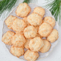 easy coconut macaroons on plate with branch beside