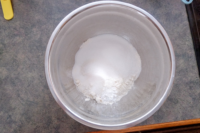metallic bowl of white dry ingredients on counter