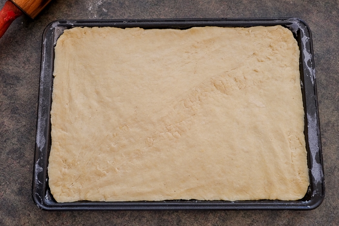 sheet cake dough in pan on counter top
