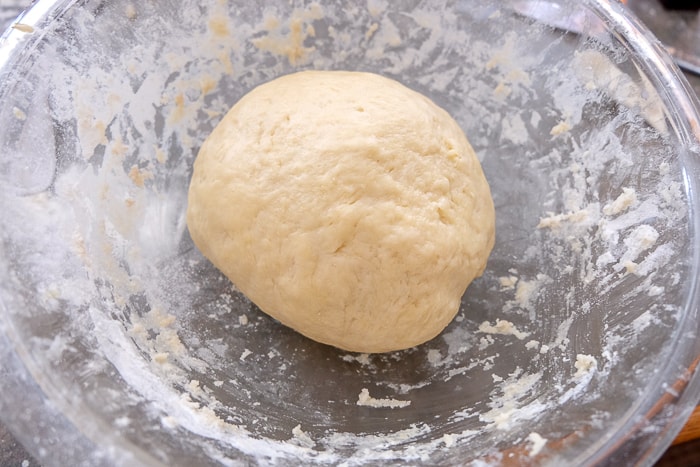 butter cake dough in clear mixing bowl