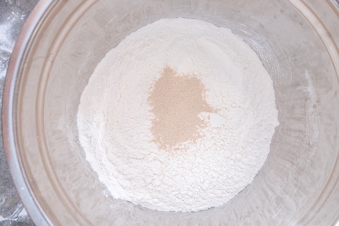 yeast and dry ingredients for german pretzels in mixing bowl