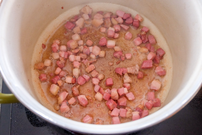 frying pancetta in large pot on stove