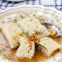 german maultaschen in bowl with beef broth