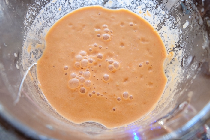 blended gazpacho soup in glass blender