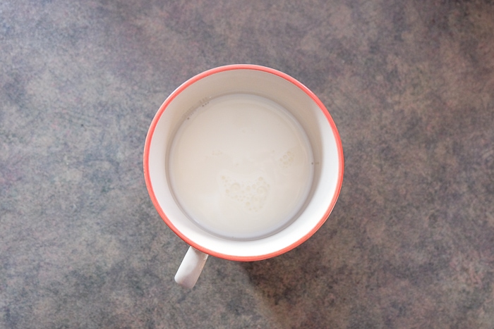 mug of warm milk on counter top