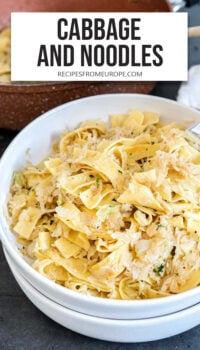 shredded cabbage and noodles in white bowl with text overlay "cabbage and noodles".