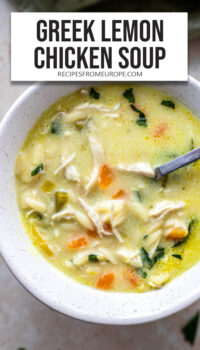 chicken soup with carrots in bowl with text overlay "Greek Lemon Chicken Soup".