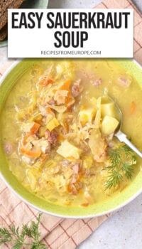 sauerkraut soup with potatoes and meat in green bowl and text overlay "easy sauerkraut soup".