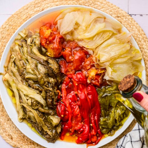 plate of roasted vegetables with olive oil poured on top.