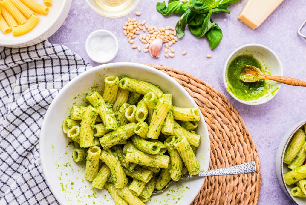 green pesto pasta in bowl ready to serve.