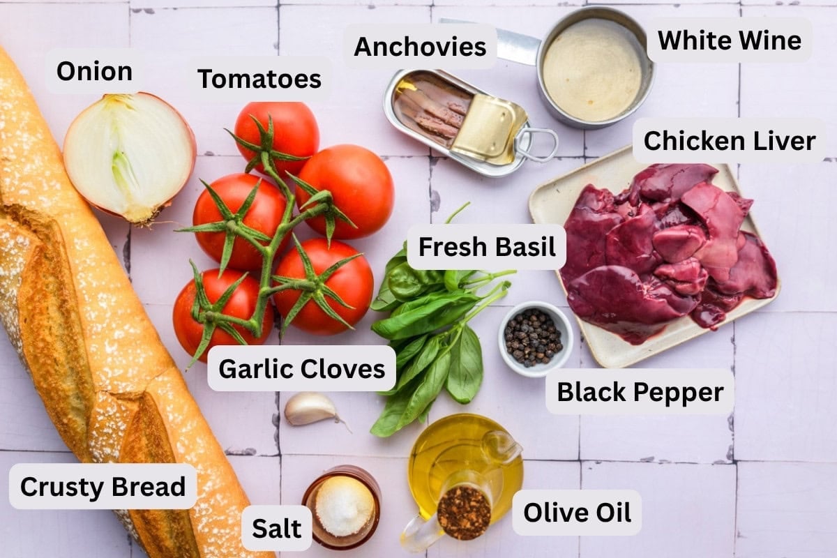 ingredients to make bruschetta on counter with labels.