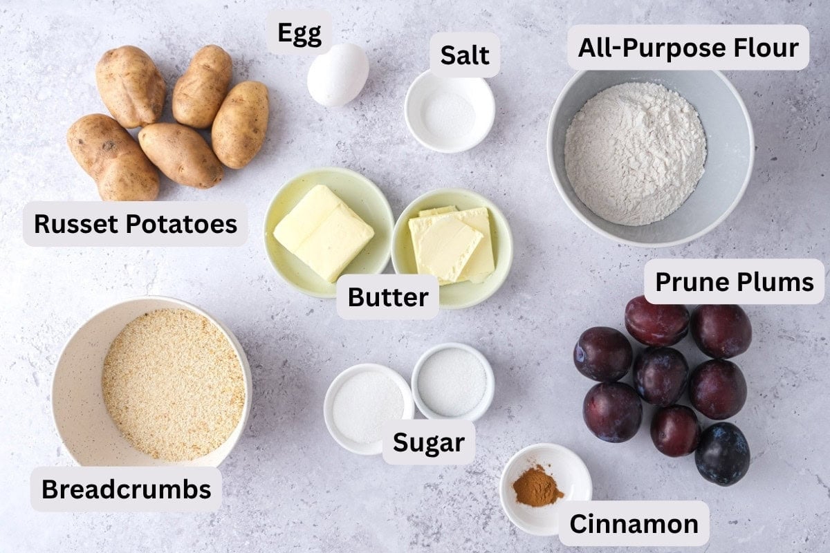 ingredients to make plum dumplings on counter in bowls with labels.