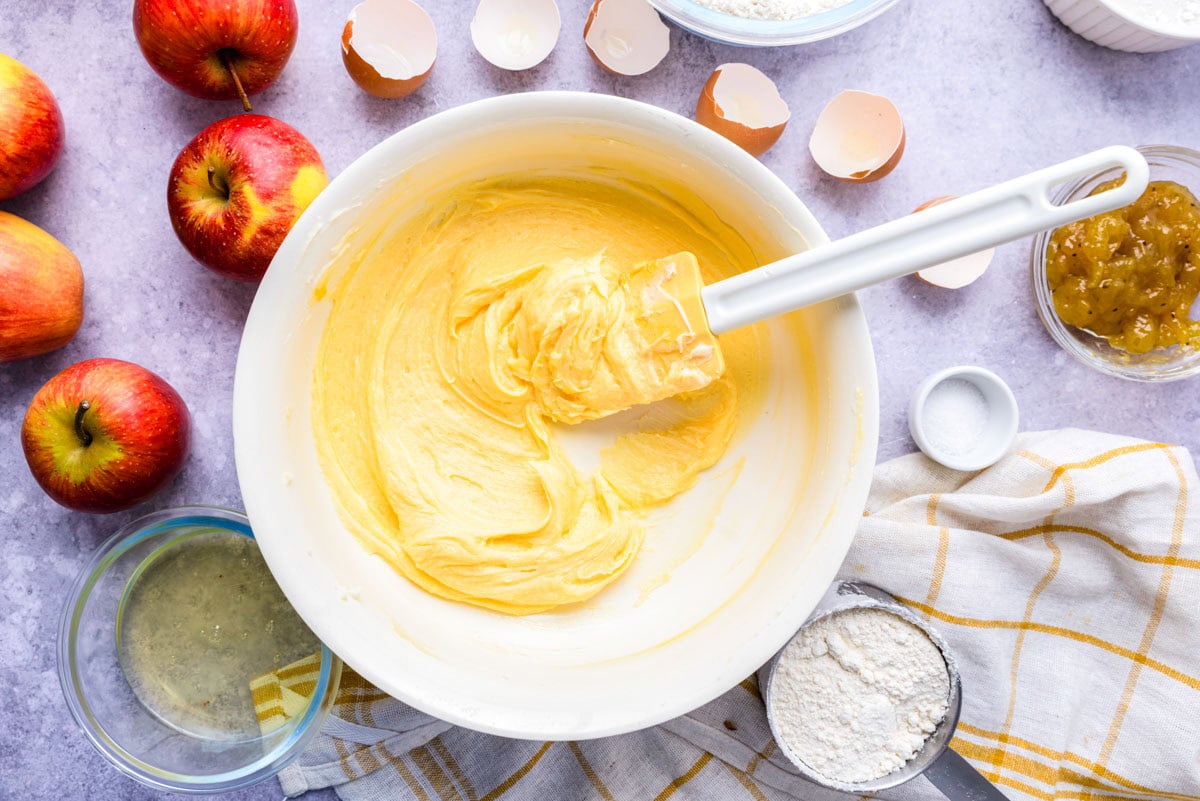 creamy egg yolk butter mixture in bowl on counter.